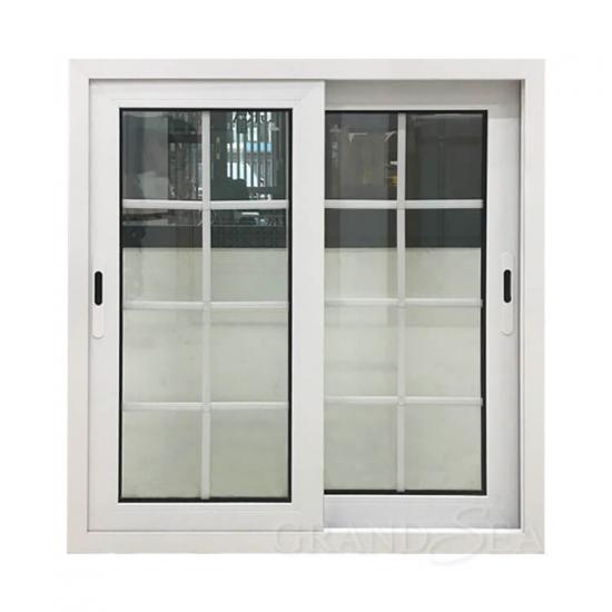 white color aluminum frame window with grill design